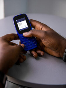Giesecke+Devrient and Instacash are enabling payment transactions with the digital Lilangeni for the first time via a feature phone. (Source: Wirestock / AdobeStock